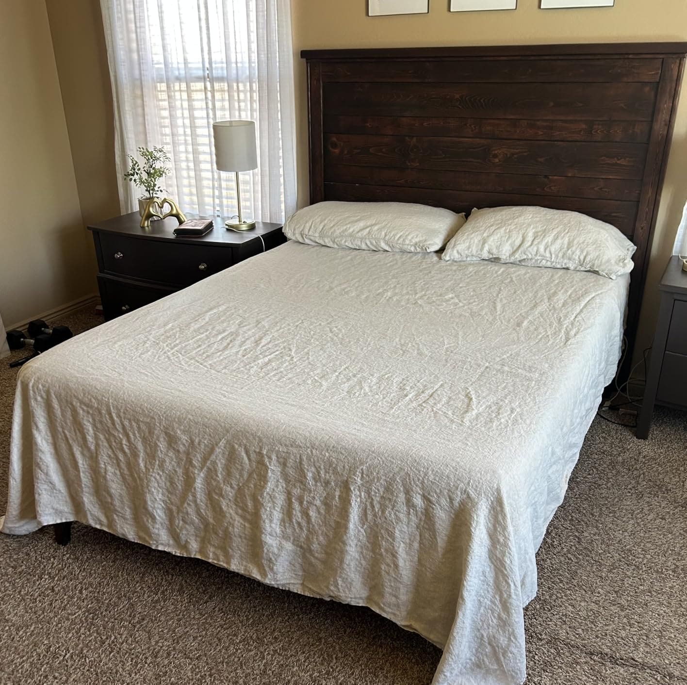 DAPU flax sheets styled on a bed with a lived-in look