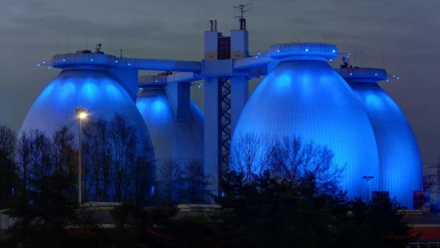 A picture showing illuminated sewage plant of biogas.