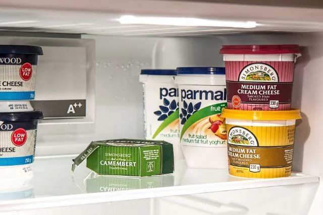 An image showing food stored in a fridge.