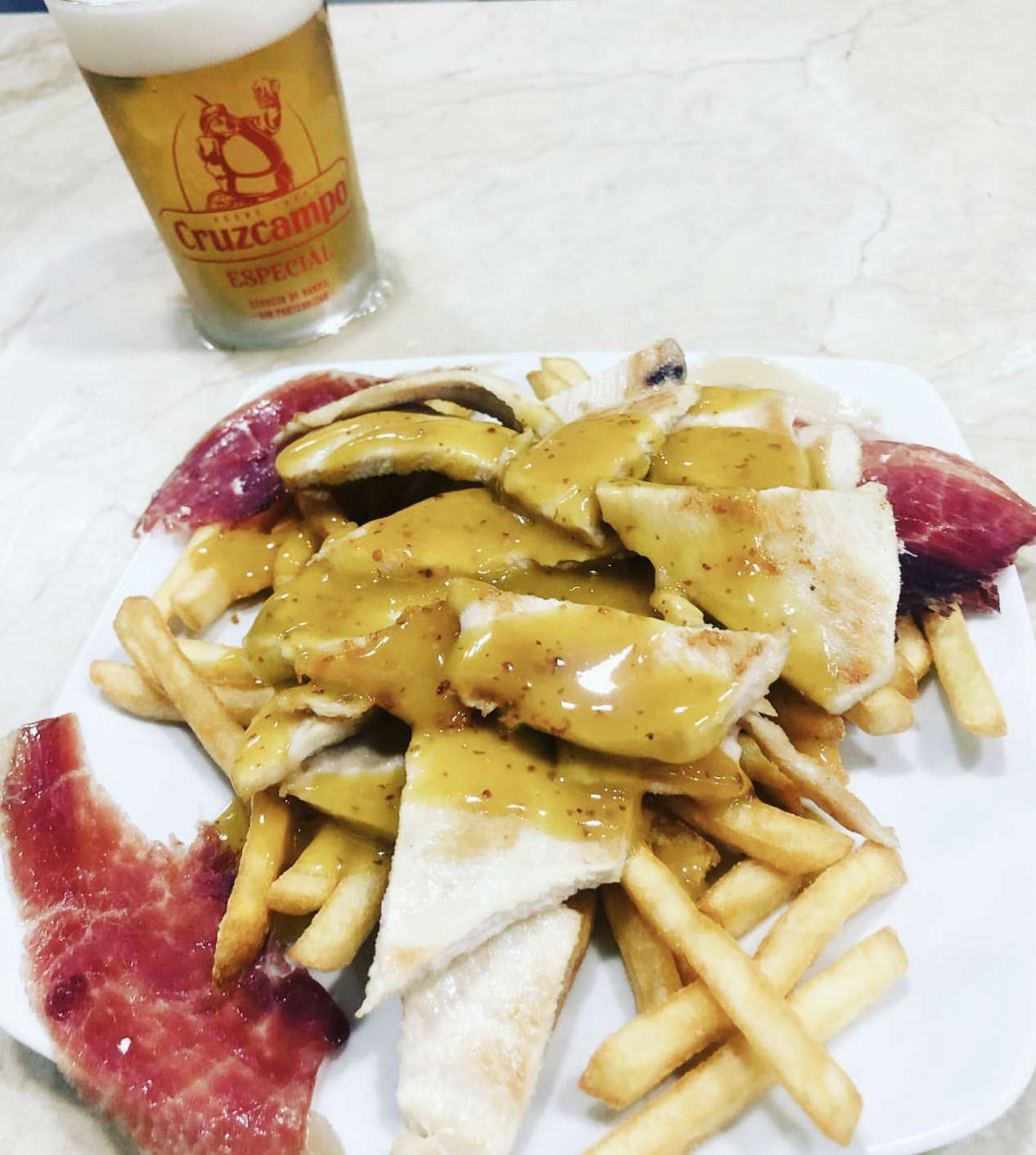 Tapa de pollo o lomo con salsa de miel y mostaza