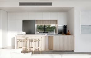 First home buyers brave Sydney's torrential rain to snap up apartments in Lumia
