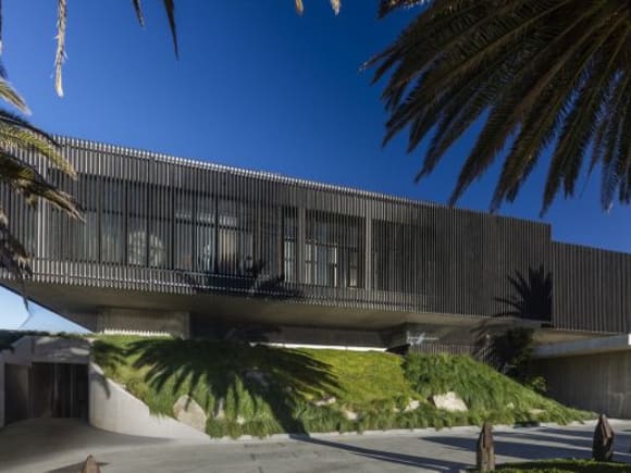 The Stokehouse appears to float above the sand dunes. Image: Supplied St Kilda foreshore's Stokehouse reborn