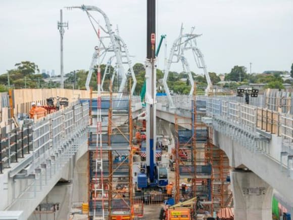 The new elevated track around Clayton - image: LXRA Clayton's near-complete station is ringed by eleven projects