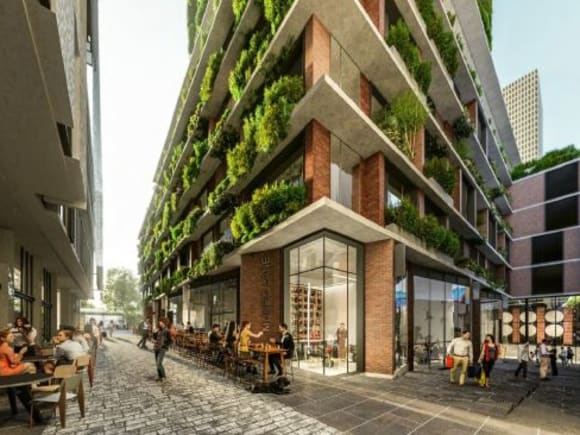 Internal passage softened by greenery.Planning image: Bates Smart / 6 Degrees Architects Big numbers sought for PDG's Munro Site development