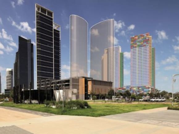 Silhouetted south Wharf Towers in an evolving built for context. Image: MGA Architects Lorimer Street residential towers draw closer to launch with construction tender announced