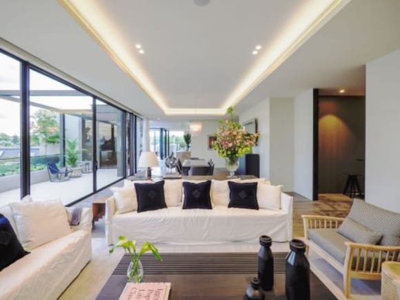 Living area and outdoor terrace What it takes to deliver Melbourne's latest million penthouse