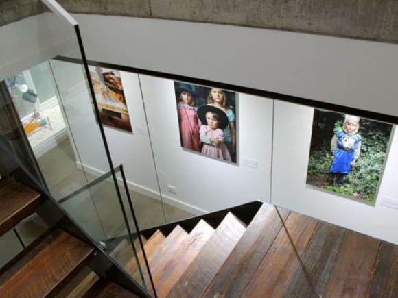 2 Girls' entry passage adorned with art In focus: 2 Girls building, Abbotsford