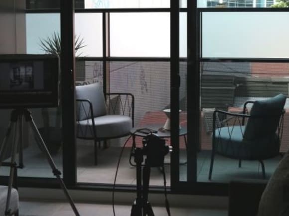 Professional photographers get to work on a completed apartment A look inside Noir as the project races toward completion