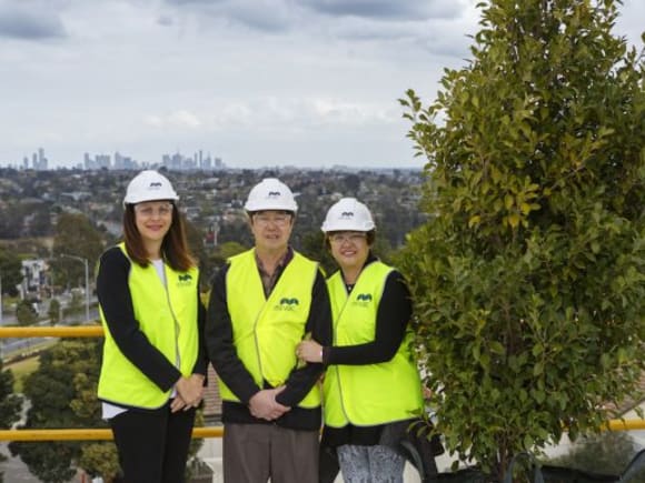 Anne Jolic (Mirvac Development Director Residential Victoria) with Eve and Lee Mock (Phoenix purchasers) A Phoenix rises at Mirvac's Tullamore