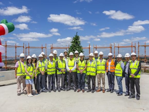 Representatives from the project team at the topping out ceremony. Image Ganellen tops out Stage 1 of Greenland's Macquarie Park project