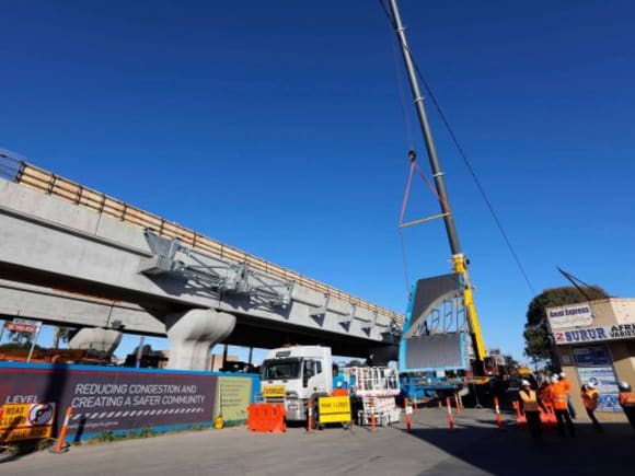 The new Noble Park station canopy being lifted - image LXRA New station canopy and escalators appear at Noble Park