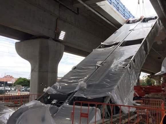 Escalators have been moved into place to allow access to the elevated station - image LXRA New station canopy and escalators appear at Noble Park