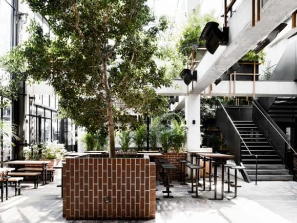 The retractable roof allows ample light into the Beer Garden. Image: Supplied TILT and Technē shed some light on the Village Belle Hotel revamp