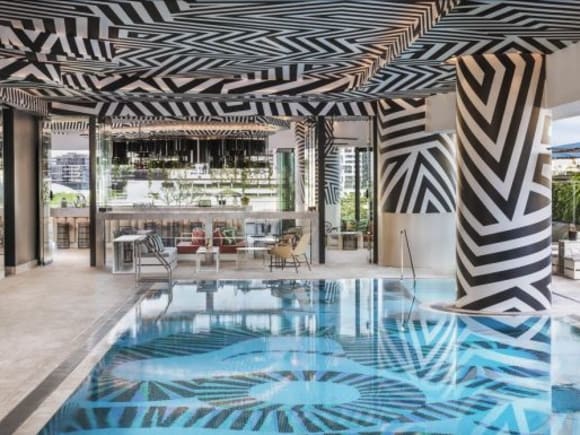 The zebra patterned pool Brisbane stepping into its own as a tropical hotel destination