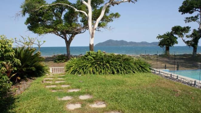 Beachfront listed with Dunk Island views