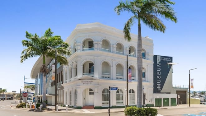 Billionaire Clive Palmer wins auction of heritage-listed Townsville building
