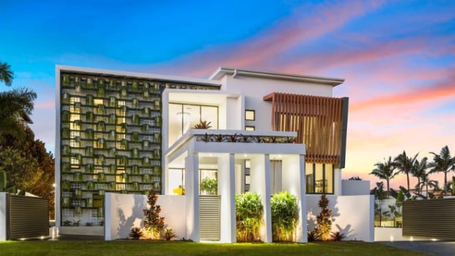 Newly built Sovereign Islands home with vertical garden facade home listed