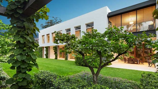 18 car home garage? Malvern Alan Powell-designed trophy home for sale