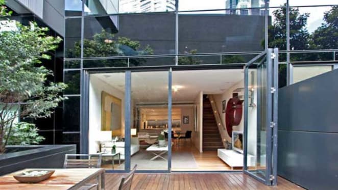 TV presenter Tara Moss relists Sydney CBD pad