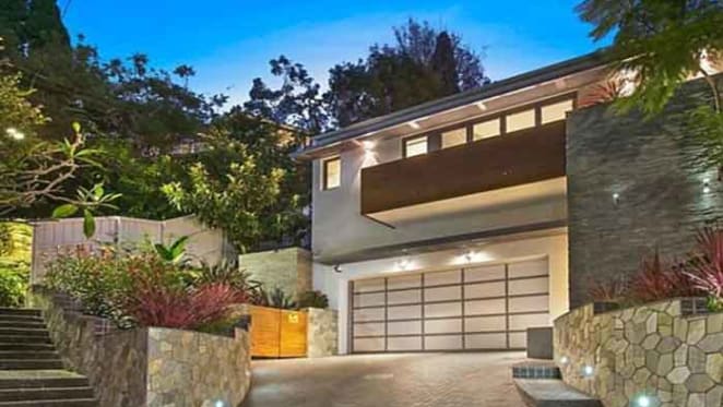 Mitchell Starc buys at North Curl Curl from Jennifer Hawkins