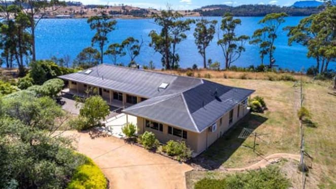 Contemporary Tasmanian beach house listed at Opossum Bay