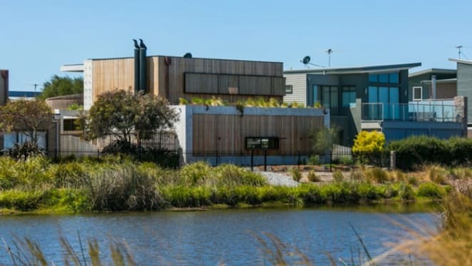 Concrete abounds at contemporary Torquay offering under garden roof