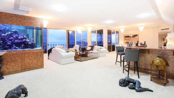 Main Beach beachside penthouse listed with three tonne aquarium