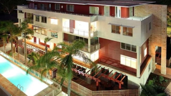 Sydney real estate agent questioned by police in China after wife found dead in a freezer
