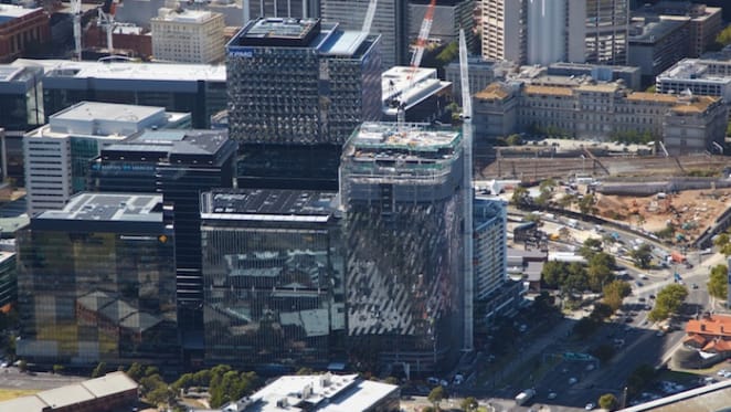 Multiplex tops out final commercial office tower at Collins Square