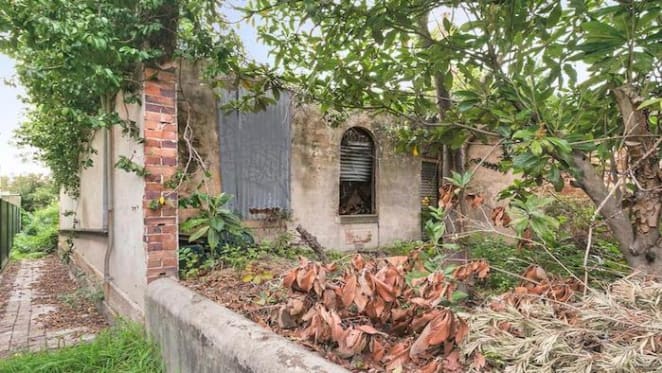 Overgrown Enmore former boarding house sold for less than expected