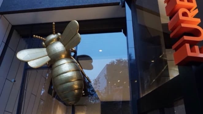 Melbourne's Eureka Tower gets illuminated golden bees in new Richard Stringer public art installation