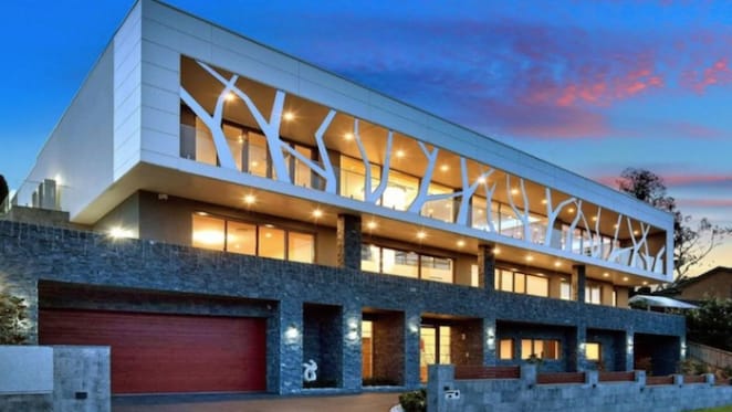 Contemporary Kellyville home with branch like facade listed