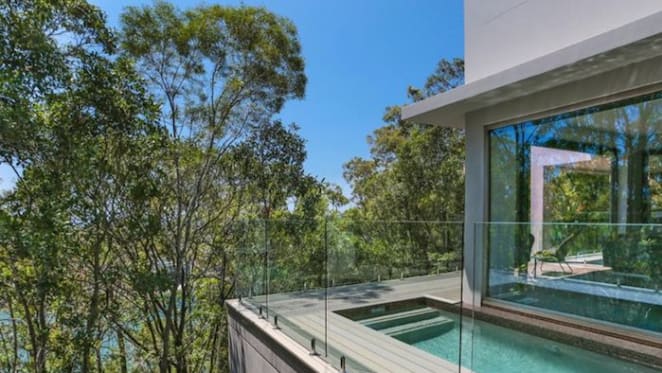 Noosa Hill home hovering over the natural environment for sale