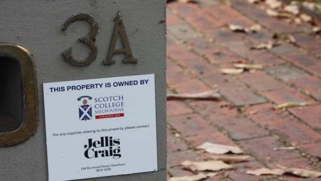 Scotch College attach ownership plaques to the many houses they own before latest Hambledon Road, Hawthorn auction