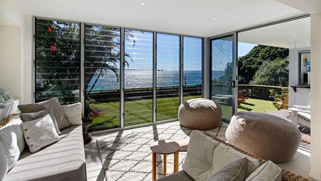 Businessman Mark Rowsthorn sells at Wategos Beach