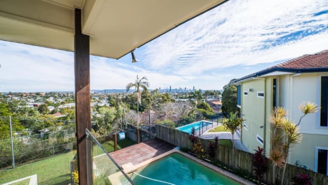 Cricket legend Ian Healy sells at Coorparoo