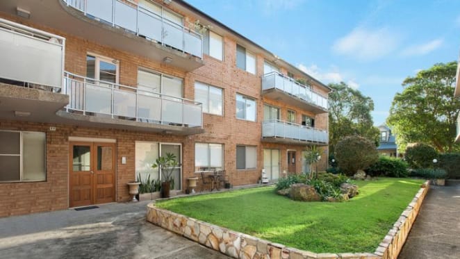 Half of Newtown apartment block for sale