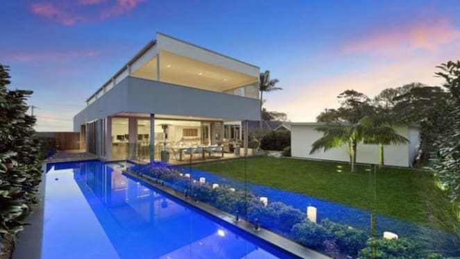 House Rules presenter Joh Griggs sells at Collaroy