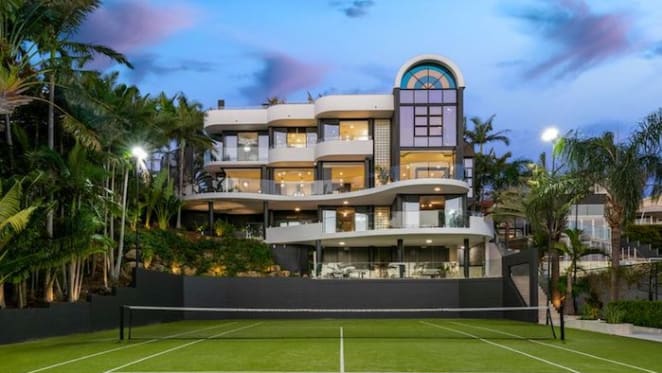 Hawthorne riverside home with private beach hits market