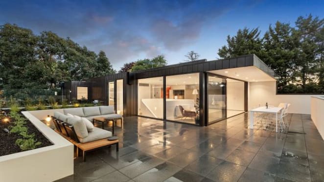 Two level Kew penthouse with valley and mountain views listed