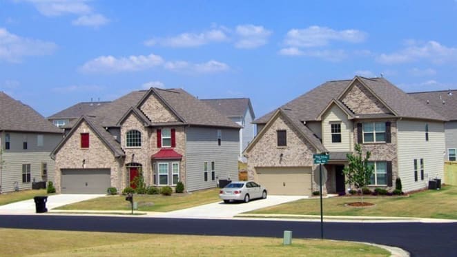Land costs are high, but that's not stopping the construction of McMansions