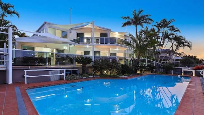 Riverfront Minyama trophy home sold