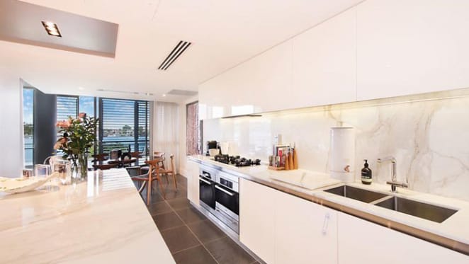 Sunland Group boss lists riverfront Newstead apartment