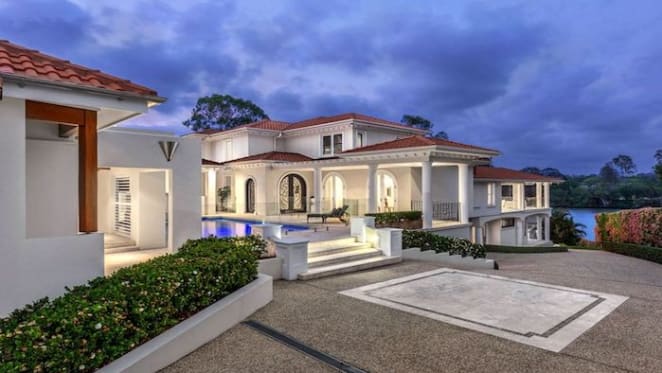 Tennyson riverfront trophy home across three titles hits the market