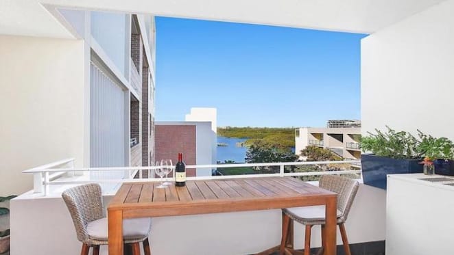 Bachelor contestant Bec Chin and Dean Vicelich sell at Wentworth Point
