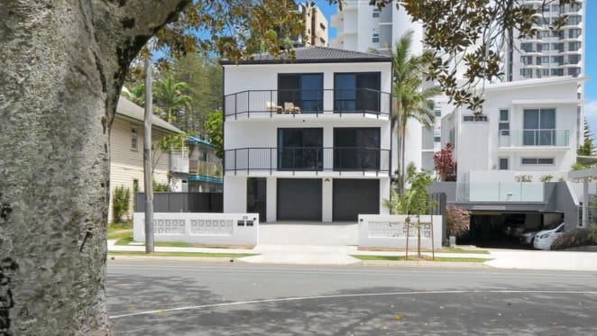 Surf legend Mick Fanning lists Coolangatta apartment block