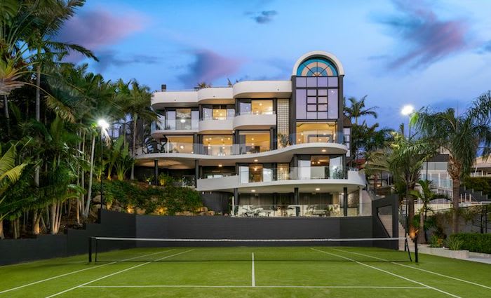 Hawthorne riverside home with private beach hits market