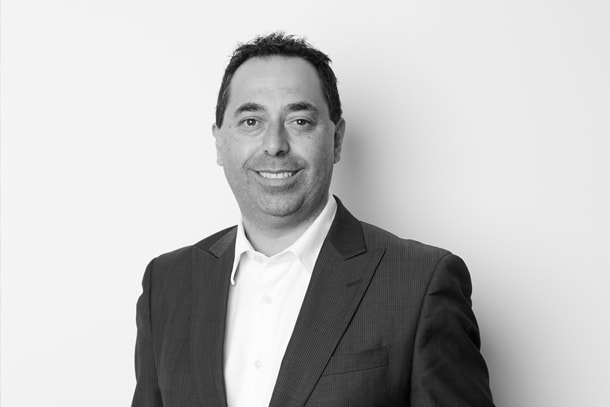 Monochrome photograph of Fred Nucara from Beller Commerical