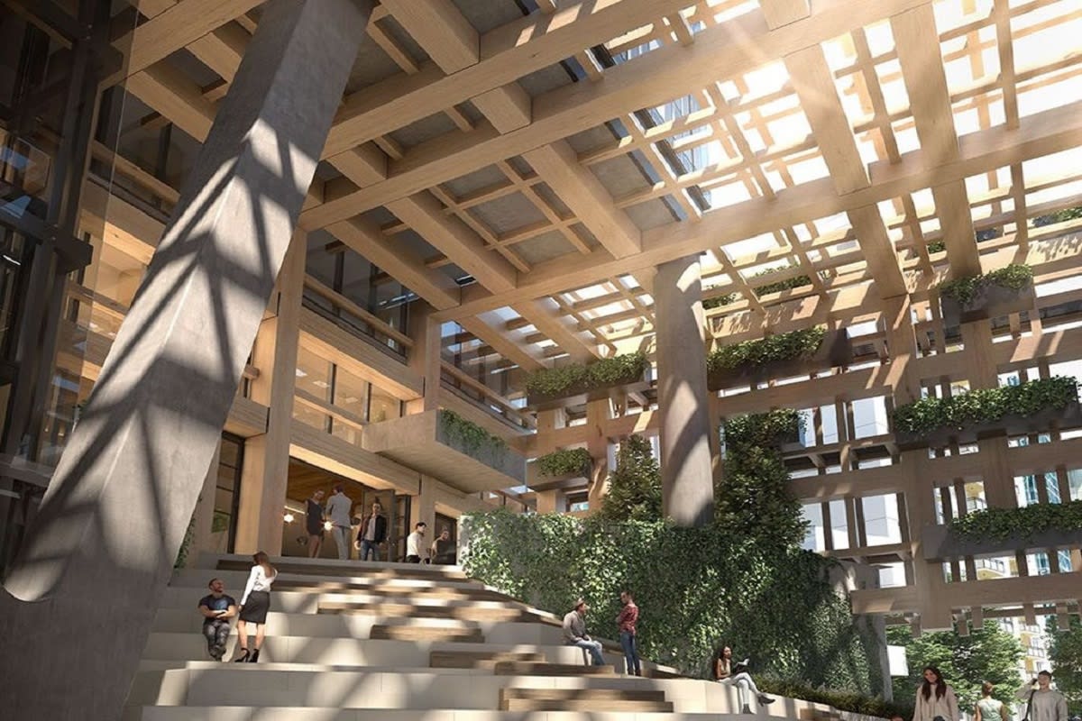 Yarra One features a timber clad public atrium and integrated planter beds.