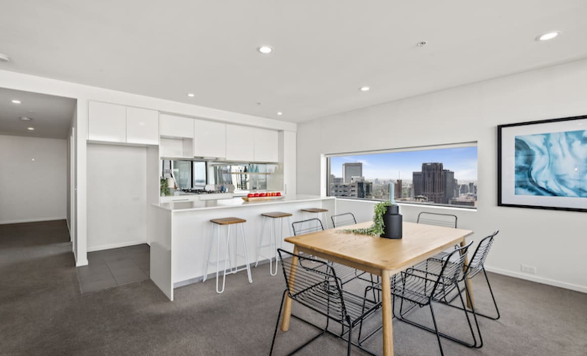 In-room auction nets $4.11 million for inner city Melbourne apartments